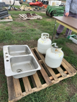 Double sink and two propane bottles