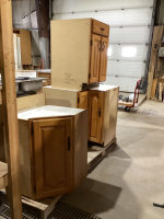 LOWER KITCHEN CABINETS W/ DOUBLE STAINLESS SINKW/ TAPS AND SINKERATOR