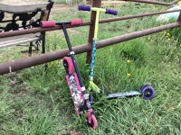 (2) SCOOTERS -NINJA TURTLE AND PINK ONE