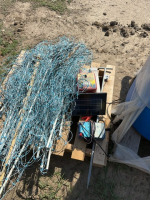 Pallet of solar, fencing, and wire