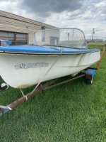 Motor boat, trailer, and Evinrude motor