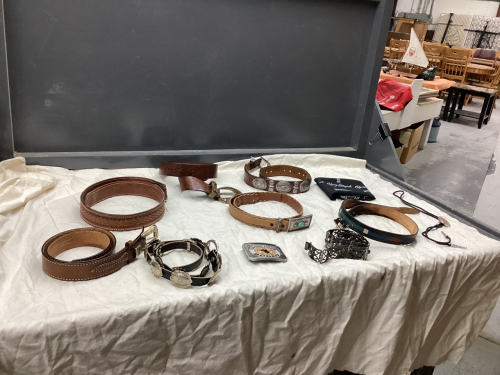 LEATHER AND METAL BELTS, COORS BOLO TIE, CALGARY POLICE RODEO BUCKLE, CALGARY STAMPEDE NECK KERCHIEF