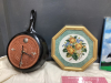 (3) SMALL BOXES OF HOUSEHOLD ITEMS - CAT BOOKS, DECOR, CAST FRYPAN CLOCK, NEEDLEPOINT PICTURE, "THE ROCK" FRY PANS - 2