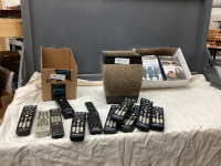 COLLECTION OF REMOTES, A FEW DVD'S AND STONELOOK PLANTER
