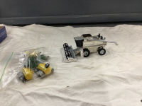 ERTL METAL CASE 25TH ANNIVERSARY COMBINE 2388 AXIAL FLO AND SMALL BAG PLASTIC JD IMPLEMENTS
