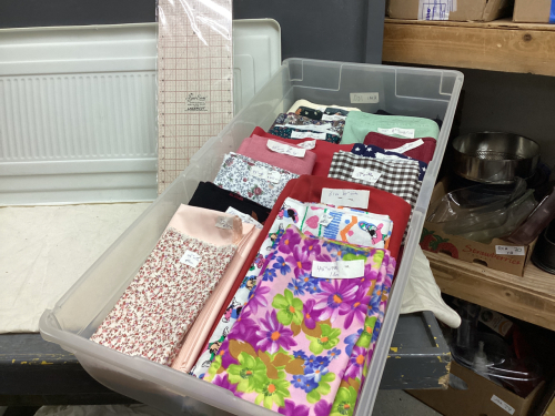 TOTE OF MATERIAL, SEWING RULER