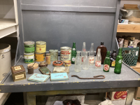 GOOD LIDDED TOTE W/ VINTAGE TOBACCO TINS, SYRUP TIN, CIGARETTE TINS, AND OLD BOTTLES