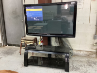 50" PANASONIC FLAT SCREEN TV WITH REMOTE ON GLASS STAND