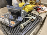 TOTE W/VEHICLE FLOOR MATS, SEAT COVERS, CHOCKS, CAULKING GUN, TRACTOR LIGHTS, GM MANUAL, AIR STONE, AIR LINES