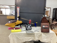 THUNDER TIGER RAPTOR 30 CLASS RC HELICOPTER W/ STSORAGE/POWER BOX AND COMES W/ (3) GALLONS NITRO FUEL