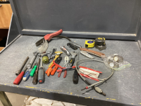 BOX OF MISC TOOLS - SCREWDRIVERS, TAPE MEASURES, PLIERS, UTILITY KNIVES