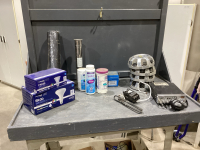 MISC BOX- CHEV HUB CAPS, SPA CHEMICALS, CB RADIO, OUTDOOR LIGHT FIXTURES