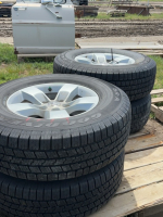 Set a four passenger tires on 2017 Dodge 1500 rims