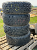 Stack of four truck tires