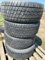 Set of four Cooper tires on Lincoln rims