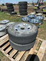 ( 2) Ford 17 inch general tires on eight bolt rims