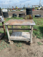 Small, steel rolling table
