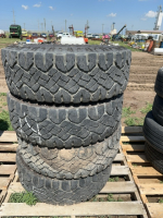 Stack of four truck tires