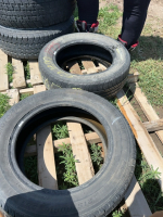 Two mismatched car tires
