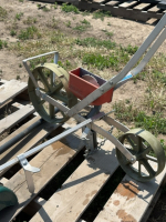 Row planter and snow shovel