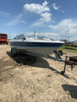 22 foot Bayliner Capri motor boat with trailer w/ paddles & skis