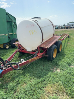 Versatile tandem axle boom sprayer