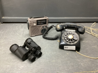 BOX W/ OLD STYLE ROTARY PHONE W/ METAL COVERING HANDSET, VINTAGE RADIO & BINOCULARS