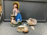 RESIN GIRL FIGURINE AND COLLECTION OF SHELLS