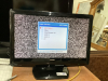 SMALL TOSHIBA 21" FLAT SCREEN TV W/ REMOTE ON STAND
