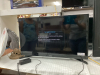 SAMSUNG 31" FLAT SCREEN TV W/ REMOTE ON STAND