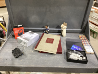 CRIB BOARD, WW2 HISTORY BOOK, WILLOW TREE COLLECTIBLE, FOOTBALL BOBBLE HEAD, WIRED HEADSET, DIAMOND PEELING SKIN CARE, NEATCELL