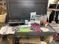 (2) BOXES W/ GRIDDLE, NEW BAG OF OATMEAL, SUGAR IN CANISTER, MUGS,