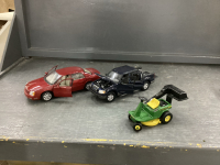 (2)DIE CAST COLLECTOR CARS AND A JD GARDEN TRACTOR
