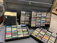 2 SPEAKERS + 4 TRAYS OF CASSETTES