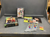 ELVIS COLLECTIBLES - (2) MAGAZINES, (2) PUZZLES, (2) PR SOCKS, CASSETTE TAPE