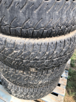 4 Truck tires on aluminum rims