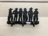 CAST COWBOY'S W/ (3) BULL HEAD HOOKS