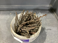 BUCKET OF OLD DRILL BITS