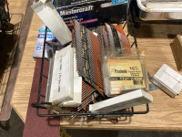 WIRE CRATE WITH ASSORTED NAILS, STAPLES, SANDING BELT