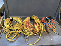 BUNDLES OF EXTENSION CORDS + TROUBLE LIGHT