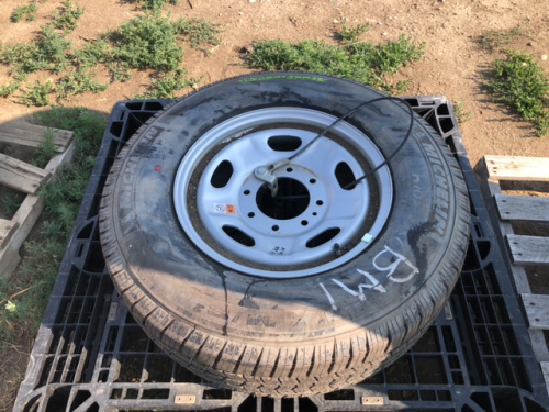 Unused Michelin spare tire and rim