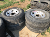 Set of 4 truck tires and 8 bolt Chev rims