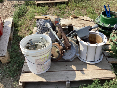 PALLET WITH SHINGLES,BARB WIRE, PUMP PRIMERS