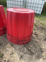 Stack of five red poly planter pots