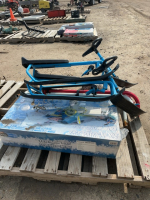 Pallet of snow, racers and hockey net