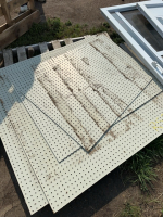 Several pieces of peg board