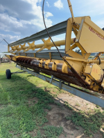 New Holland 971 Straight cut header on transport