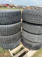 Eight light truck tires on eight bolt rims