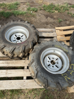 Two small tractor tires on 4 V rims