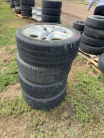 Set a four continental tires on Ford rims